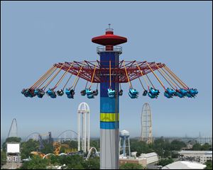 An artist's rendering shows the WindSeeker whirling 64 riders.