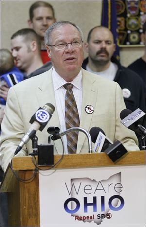 Toledo city councilman D. Michael Collins speaks at an rally against Ohio's new collective bargaining law.