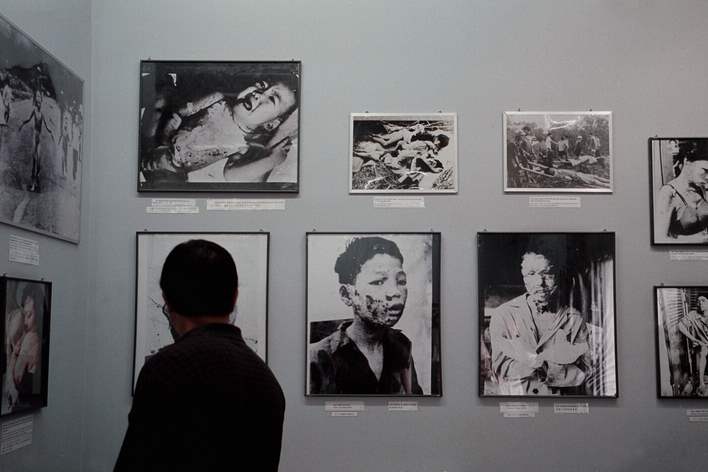 A-tourist-looks-at-an-Agent-Orange-display-in-the-War-Crimes-Museum-in-Ho-Chi-Minh-City