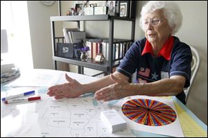 Dorothy Schabeck explains her ‘G.G.’s Red/Blue Electoral College Game,’ which helps teachers explain to middle and high school students how the Electoral College elects the president. Like many Americans, she says she didn’t understand the system outlined by the Constitution. Teacher’s Discovery sells the game.