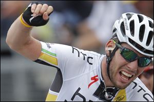 Mark Cavendish of Britain celebrates winning the fifth stage of the Tour de France cycling race Wednesday.