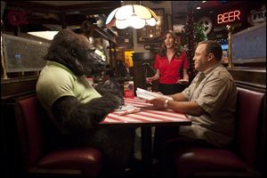 Kevin James takes his gorilla friend for a night out in the film 'Zookeeper.'