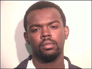 Byron Mitchell, 20, of Toledo is accused of shooting and killing Eric Daniels, 40, of Toledo.