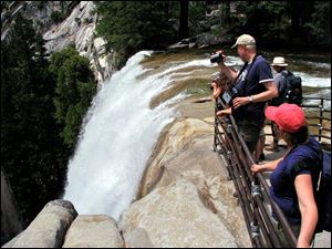 The top of Vernal Fall at Yosemite National Park, where three tourists who ignored warnings and crossed a barricade to pose for a picture were swept away and presumed dead, is shown in this 2010 photo.