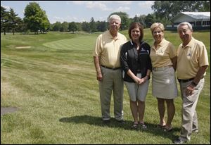 Jim Weigand, left, a volunteer, Heather Warga, volunteers coordinator, and Kathlee and Larry Ulrich, co-chairpersons overseeing seven committees, are just a few of many working at the U.S. Senior Open.