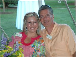 Cheryl Hardy, left, with Larry Dillin at Schedel Gardens' 20th anniversary celebration.