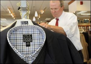 Attorney Bruce Powell shops at a Joseph A. Banks clothing store in Baltimore, Maryland, on June 27, 2011. While other clothing stores struggled during the recession, the men's store was able to thrive and even open new locations around the country.