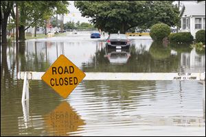 Jackson Street in Port Clinton is submerged from heavy rain in Port Clinton.