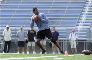 Former Ohio State quarterback Terrelle Pryor works out for NFL football scouts at Hempfield Area High School Saturday.