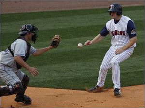 The Hens' Scott Thorman was able to get around Buffalo's Raul Chavez at the plate to score.