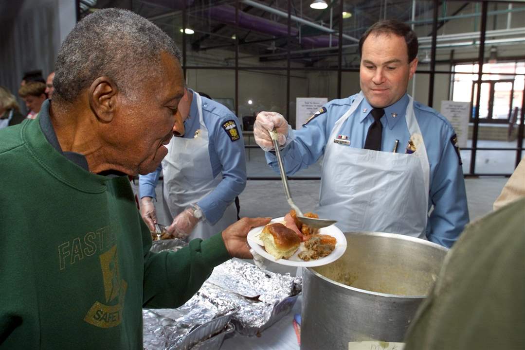 Chief-Navarre-Roy-Williams-holiday-luncheon