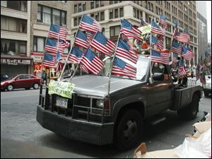 Rocky Pinciotti's collection of post-9/11flag  photographs grew to 900 and became an exhibit.