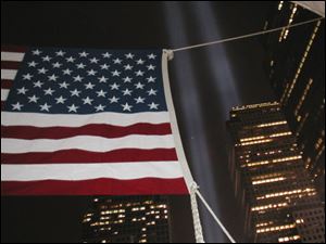 Toledo native Rocky Pinciotti began snapping pictures of flags displayed in his neighborhood after the attacks.