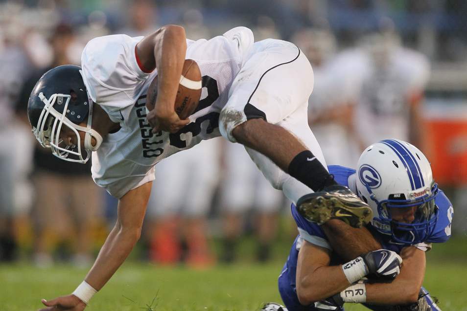 Anthony-Wayne-Max-Newcomer-tackles-Otsego-Carlos-Trevino