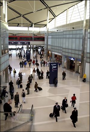 In January, 2002, just four months after the attacks, travelers at Detroit Metro Airport continued to adjust to the heightened scrutiny at screening checkpoints that awaited passengers at all American airports.