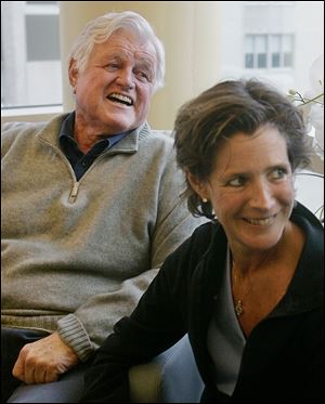 In this May 20, 2008 file photo, Sen. Edward M. Kennedy, D-Mass., smiles as he sits with his daughter Kara Kennedy in a family room at the Massachusetts General Hospital in Boston. Kara, the oldest child of the late Sen. Kennedy, died Friday, Sept. 16, 2011.