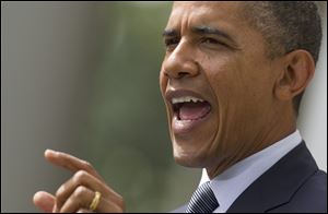 President Barack Obama discusses the national deficit in a speech Monday from the Rose Garden of the White House.