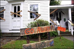 The exterior of the Pember-Furry House, a historic residence on Front Street, looks hauntingly gloomy for its tour during 'Sneeek Peeek at Trick or Treat.'