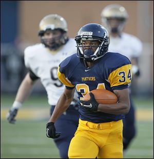 Whitmer running back Jody Webb rushed for 209 yards on 15 carries. He took the Panthers' first carry of the game and rumbled 85 yards for a touchdown to give Whitmer an early lead over St. John's.