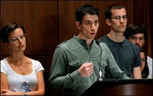 Josh Fattal addresses a news conference in New York flanked by Shane Bauer and Sarah Shourd, Mr. Bauer’s fiancee. They asked Sunday for privacy.