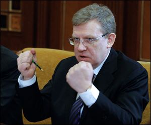 Russian Finance Minister Alexei Kudrin gestures at a meeting on military salaries chaired by President Dmitry Medvedev in the Gorki residence outside Moscow, Russia.