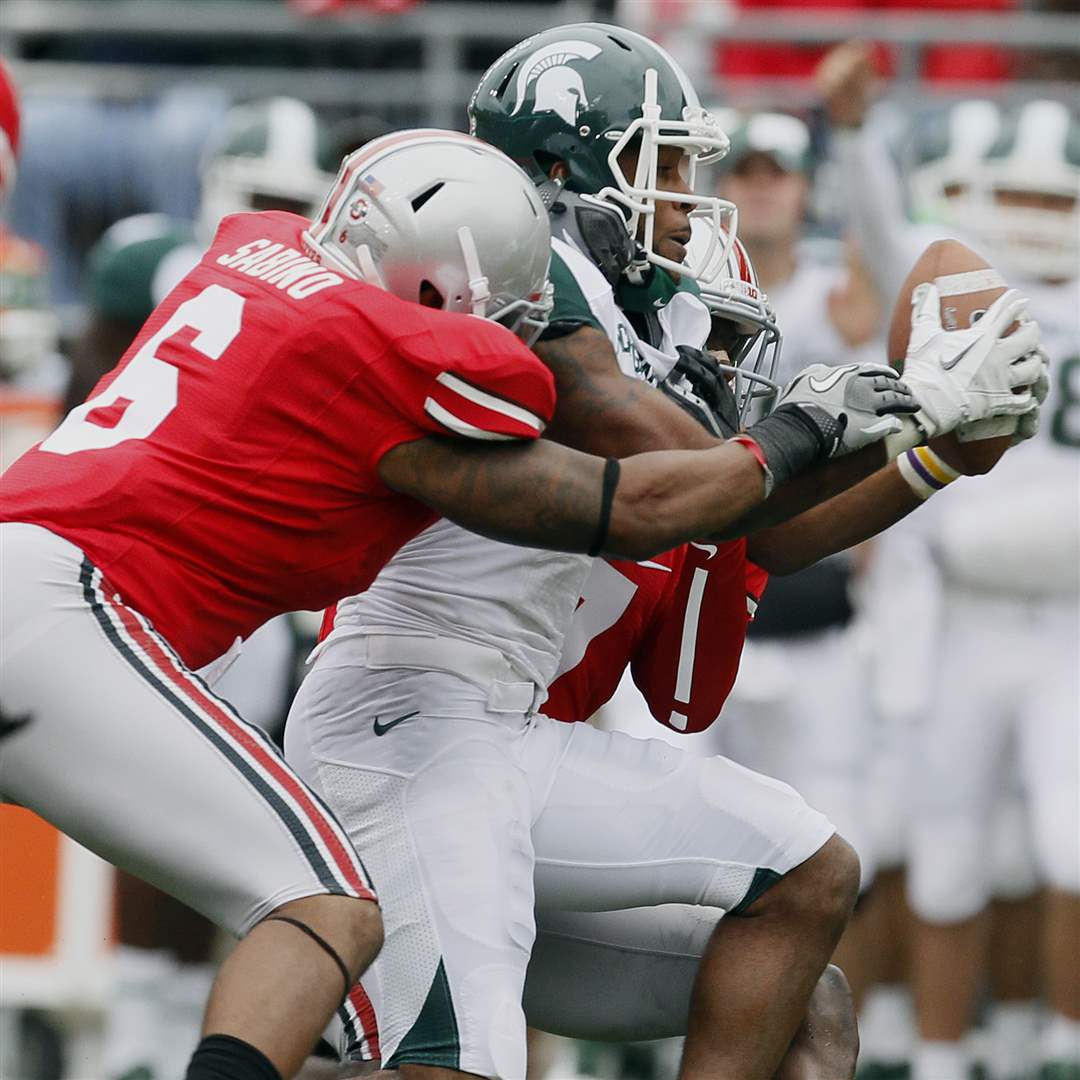 Michigan-State-WR-B-J-Cunningham-makes-a-catch-in-traffic