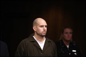 Kevin Wolever, the Toledo man accused of attacking a fire station in East Toledo, stands in Toledo Municipal Court September 16, 2011.