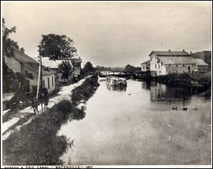 A powerful team of mules pull a canal boat owned by a minister near Grand Rapids, Ohio, in this 1897 photo.