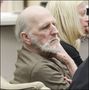 Robert Bowman, 75, listens in Lucas County Common Pleas Court . The first trial ended with the jury deadlocked.