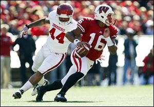 Wisconsin quarterback Russell Wilson (16) was the final piece of the puzzle for a talented Badgers team in need of a good arm.