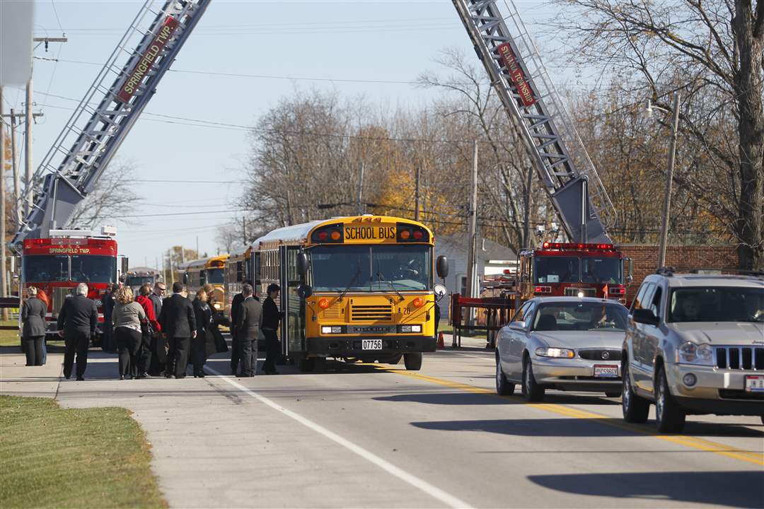 Buses-in-Charlotte-Adair-funeral-procession