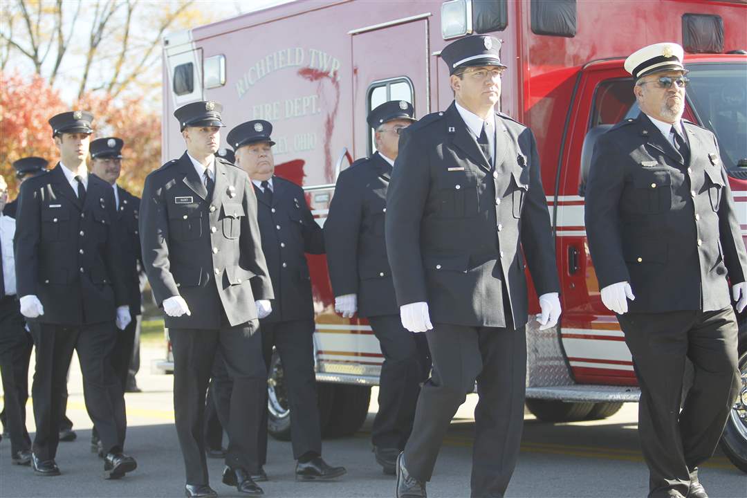 Township-firefighters-escort-Charolette-Adair-in-ambulance-to-cemetery
