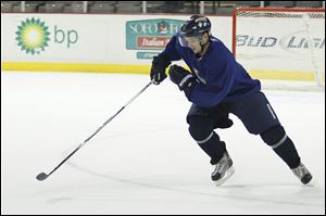 Toledo Walleye player Joey Martin, 14, heads up the ice during practice, Wednesday. 