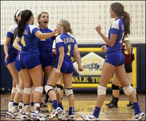 St. Ursula celebrates defeating Avon Lake in a Division I volleyball regional semifinal at Norwalk High School in Norwalk, Ohio.