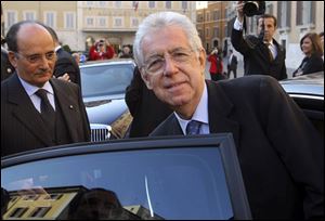 Economist Mario Monti gets in a car outside the Italian Parliament in Rome.