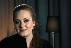 Recording artist Adele poses for a portrait in New York.