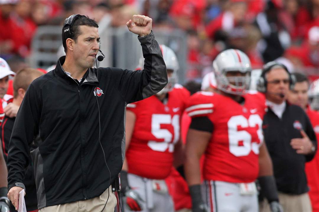 OSU-head-coach-Luke-Fickell-signals-to-his-team