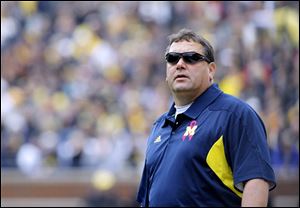 Nebraska head coach Bo Pelini of Youngstown, will face-off against fellow Ohio native, Brady Hok, pictured, of Kettering.