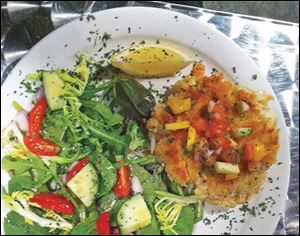 Power Lunch crab cake with side salad at Petit Fours.