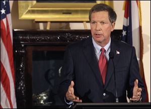 Gov. John Kasich says a headline called attention to a state problem he later addressed.