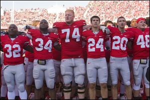 Jack Mewhort (74), a St. John's graduate, said new Ohio State coach Urban Meyer commands respect from his players.