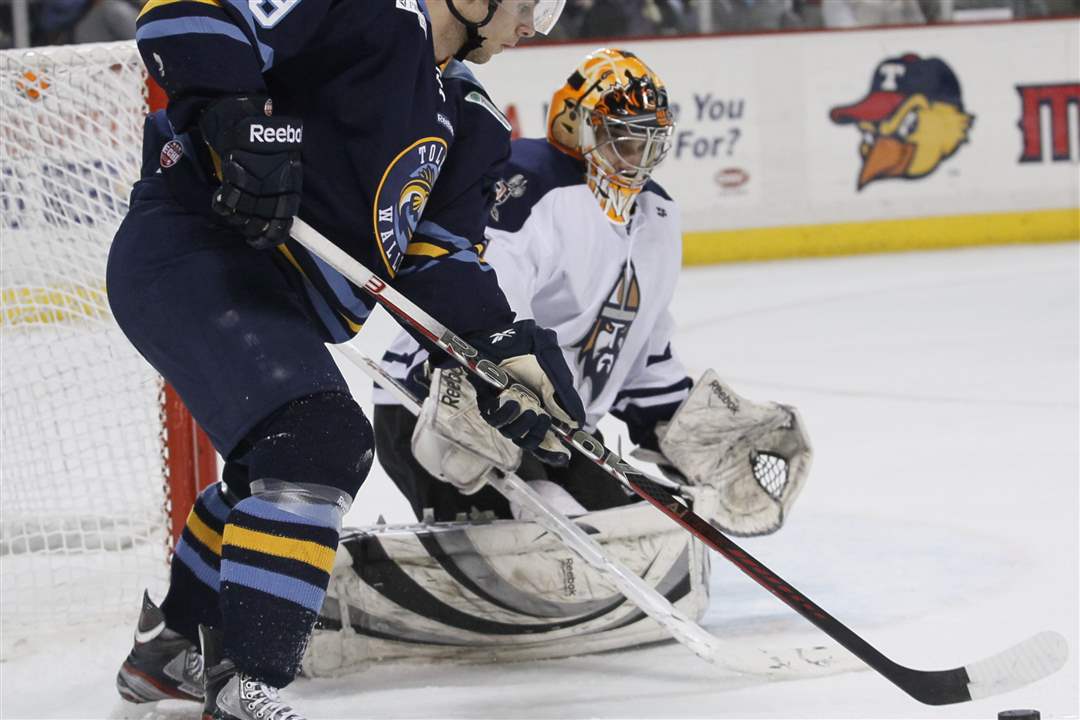 Toledo-Walleye-player-Paul-Zanette-9-looks-for-an-opening