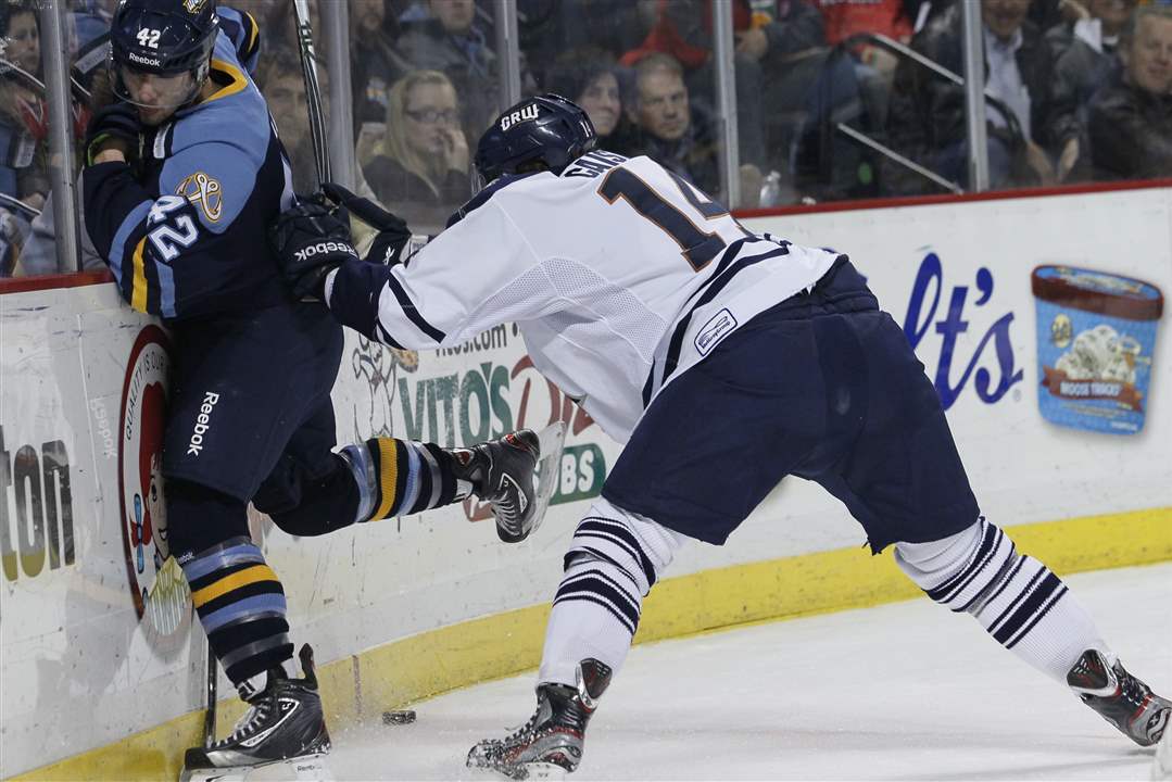 Walleye-player-Brian-Matte-42-gets-shoved-into-the-boards