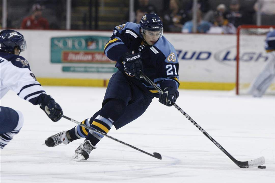 Walleye-player-Bryan-Rufenach-21-skates-the-puck-up-the-ice