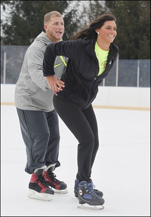 Dustin Matney, 23, and his girlfriend , Bowsher High School graduate Alivia Burns, 19, skate at Ottawa Park. They said that Toledo has seen too many cuts in recreation in schools and the city itself.