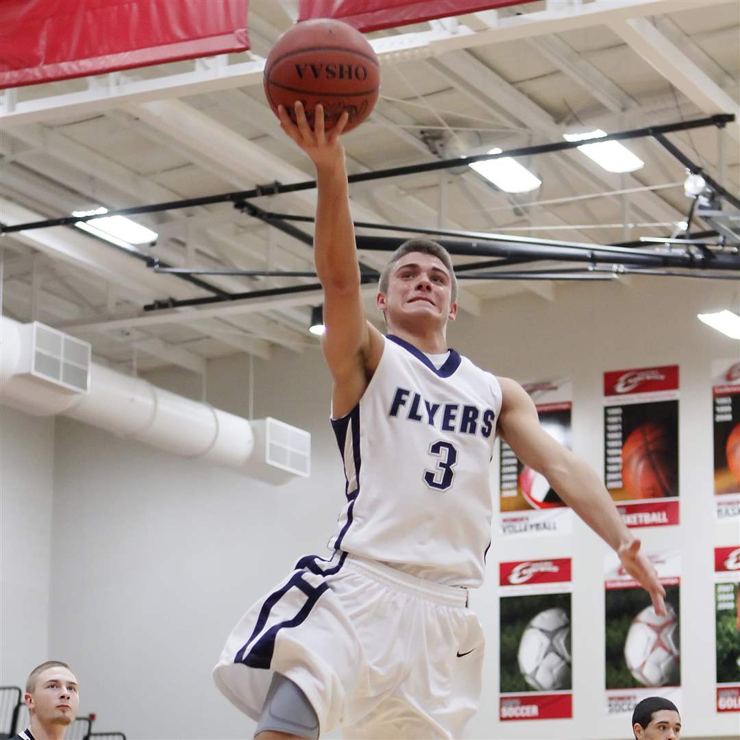 Lake-s-Josh-Tantari-flips-a-shot-toward-the-basket