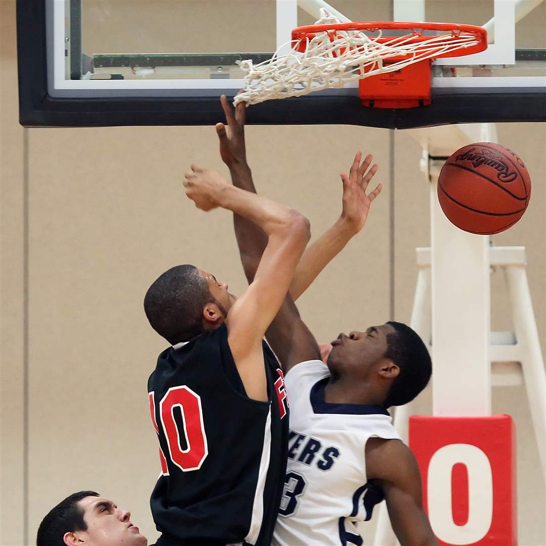 Lake-s-Marquise-Pitts-defends-against-Fostoria-s-Xavier-Ragin