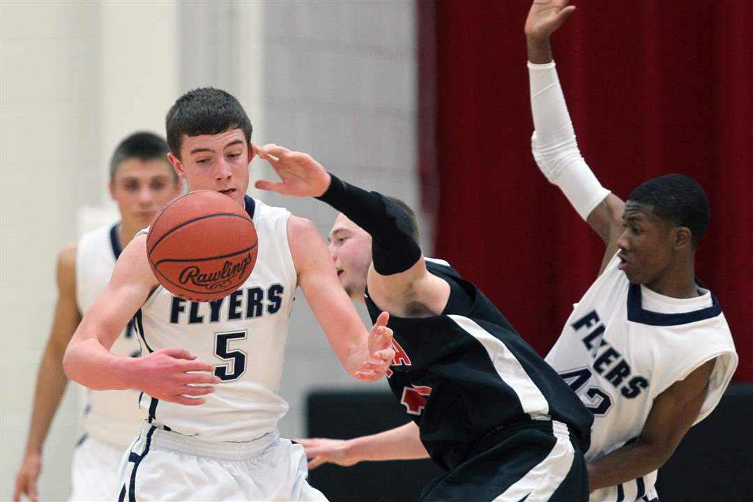 Lake-s-Jacob-Materni-steals-the-ball-from-Fostoria-s-Brandon-Glenn