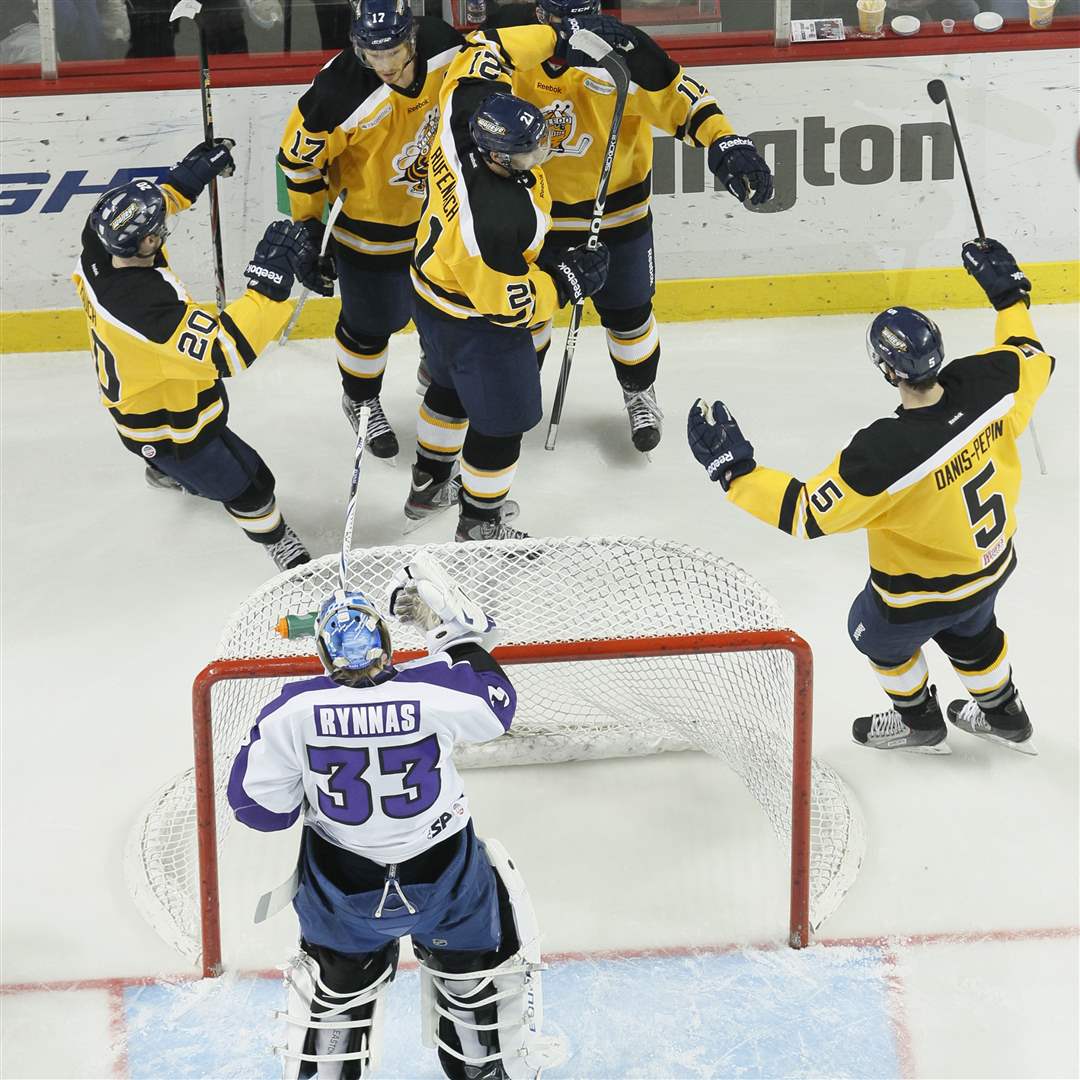 Toledo-Walleye-players-celebrate-another-goal