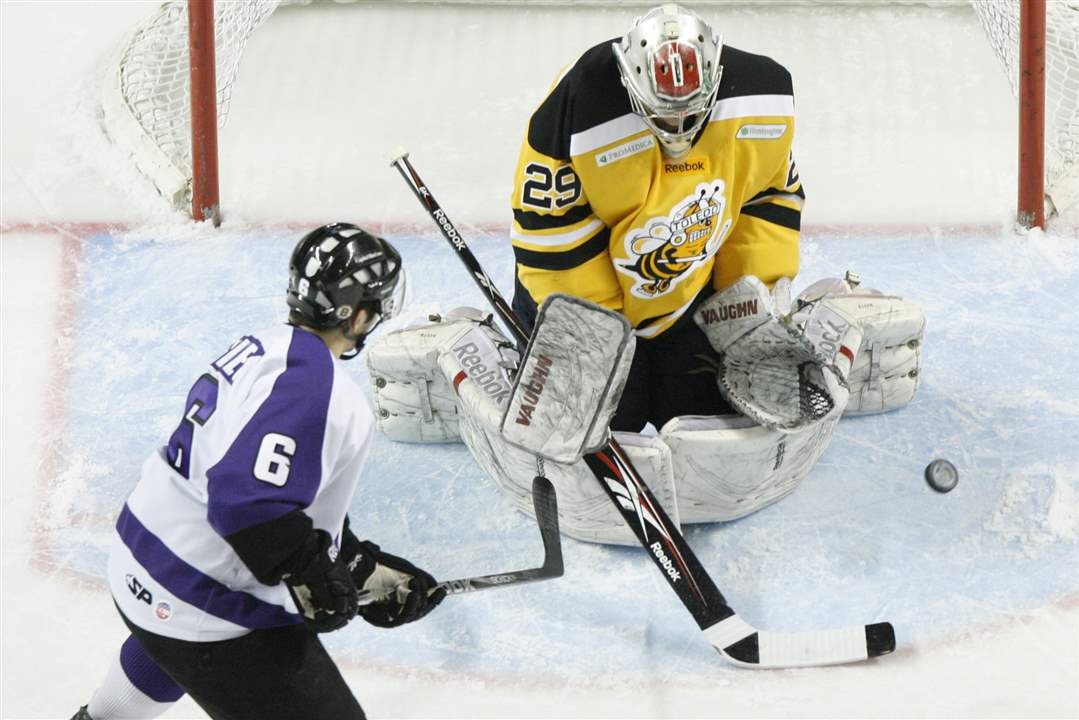 Toledo-Walleye-goalie-Dustin-Carlson-stops-a-shot